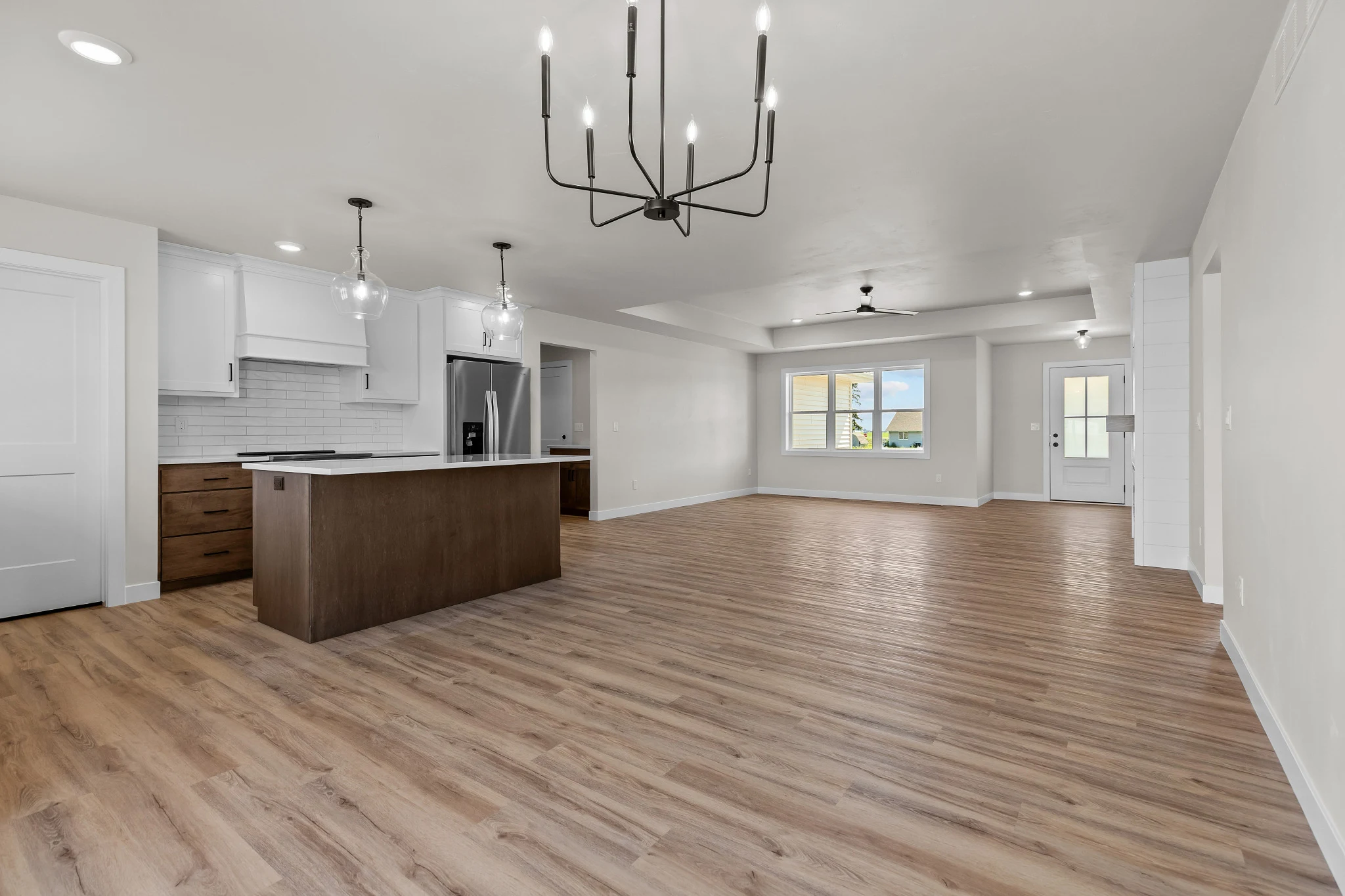 Riverwood open-concept kitchen and dining room with wide-plank flooring